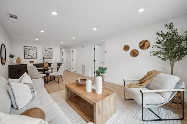 living room featuring light wood-type flooring