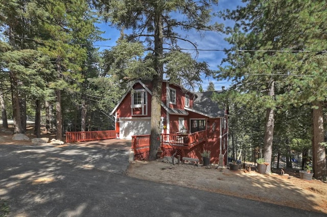 view of front of house featuring a wooden deck