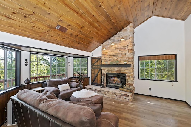 living room with high vaulted ceiling, hardwood / wood-style floors, wood ceiling, and a fireplace