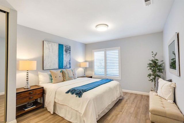 bedroom featuring light wood-type flooring