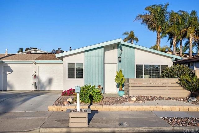 view of front of home with a garage