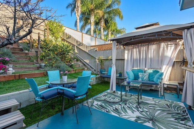 view of patio / terrace with a gazebo and an outdoor living space