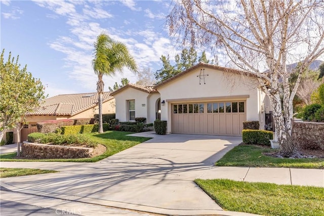 9431 Hughes Dr, Corona, CA 92883 - mediterranean / spanish-style house with a garage, driveway, and stucco siding