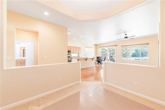 9431 Hughes Dr, Corona, CA 92883 - empty room featuring baseboards, a sink, and recessed lighting