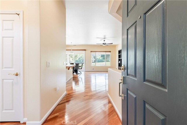 9431 Hughes Dr, Corona, CA 92883 - foyer entrance with light wood-type flooring and baseboards