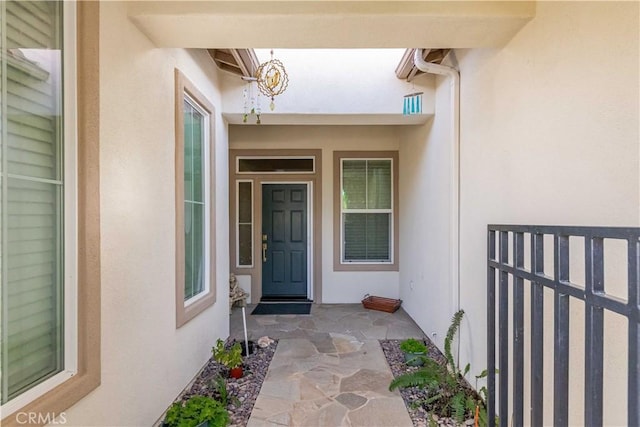 9431 Hughes Dr, Corona, CA 92883 - doorway to property featuring stucco siding