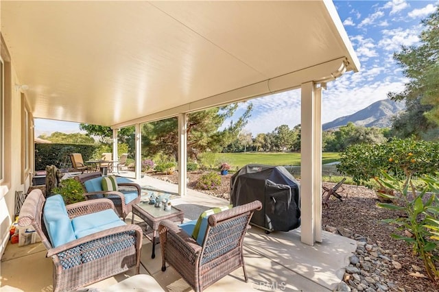 9431 Hughes Dr, Corona, CA 92883 - view of patio with outdoor lounge area, a mountain view, and grilling area