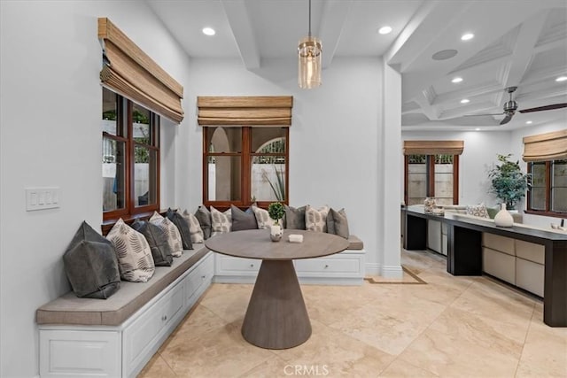 bathroom featuring ceiling fan, vanity, coffered ceiling, breakfast area, and beamed ceiling