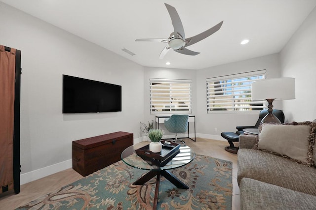 living room featuring ceiling fan