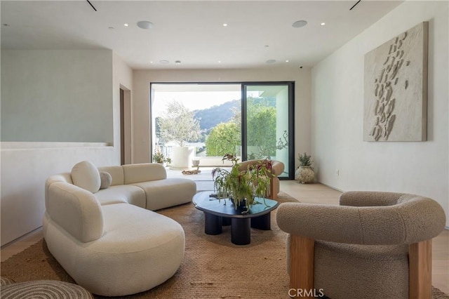 living room featuring recessed lighting