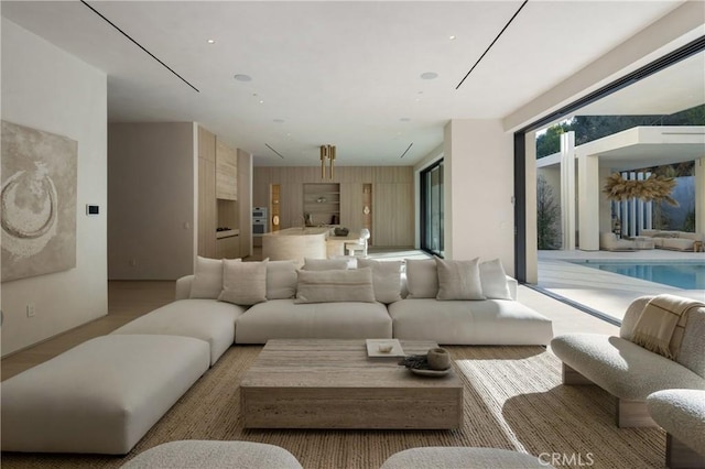 living room with light hardwood / wood-style flooring