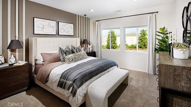 bedroom featuring light carpet