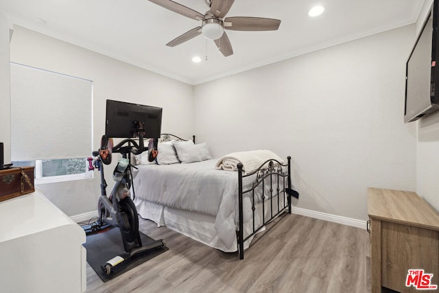 bedroom with ornamental molding, light hardwood / wood-style floors, and ceiling fan