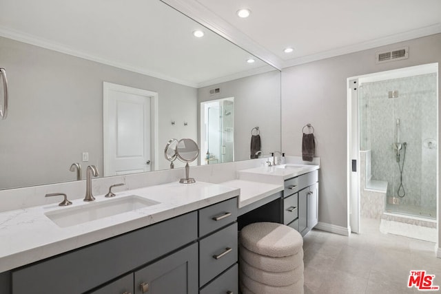 bathroom featuring tile patterned flooring, ornamental molding, vanity, and walk in shower