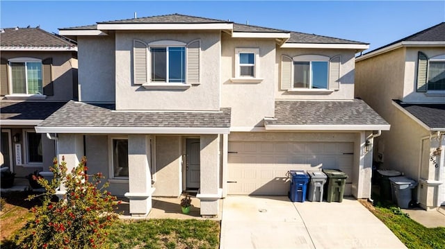 view of front of property featuring a garage