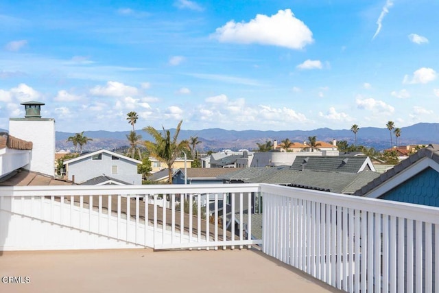 balcony featuring a mountain view