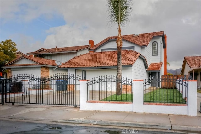 view of front of property with a garage