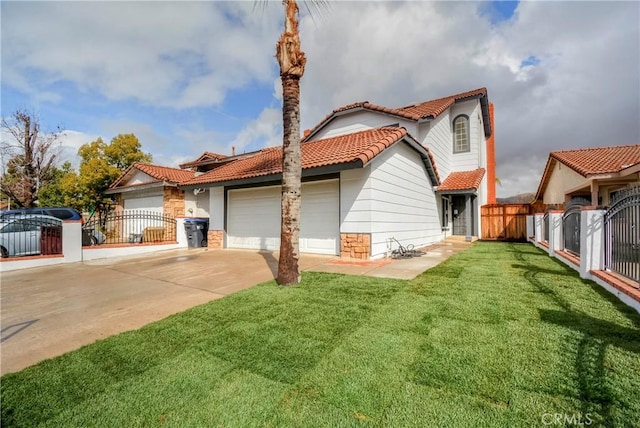 view of front of property featuring a garage and a front yard