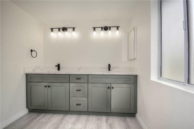 bathroom with vanity and hardwood / wood-style floors