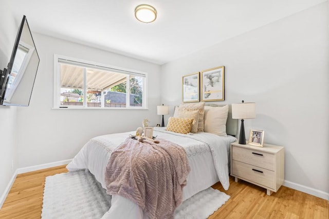 bedroom featuring light hardwood / wood-style floors