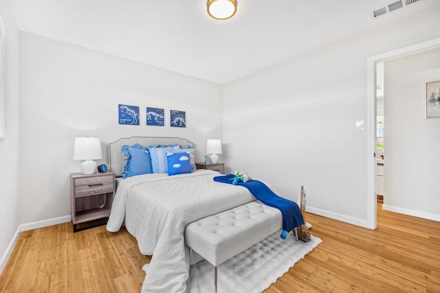 bedroom featuring light hardwood / wood-style flooring