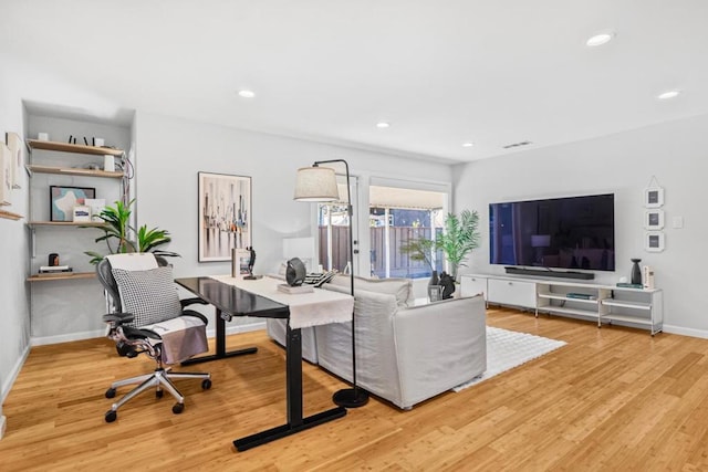 living room with light wood-type flooring