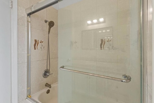 bathroom featuring enclosed tub / shower combo