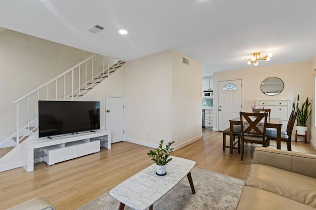 living room featuring light wood-type flooring