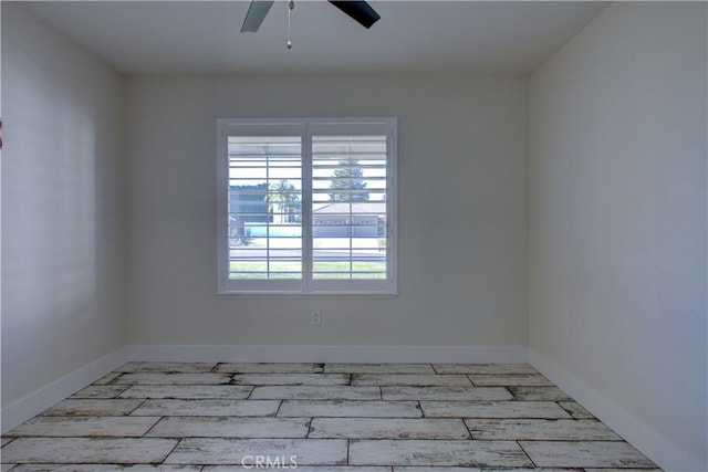 unfurnished room with ceiling fan and light hardwood / wood-style floors