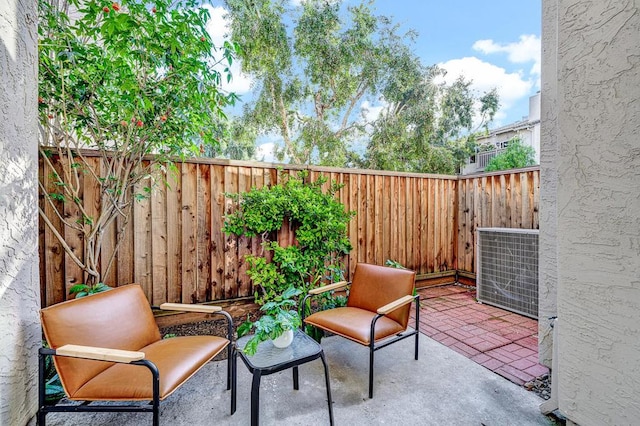 view of patio featuring central AC unit