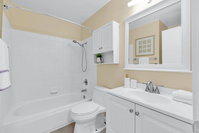 full bathroom featuring shower / bathtub combination, vanity, and toilet