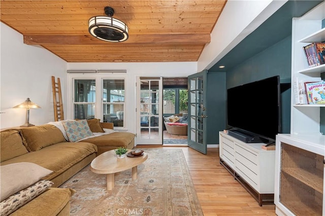 living room featuring wood ceiling, vaulted ceiling, light hardwood / wood-style flooring, and french doors