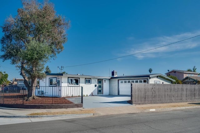 single story home with a garage