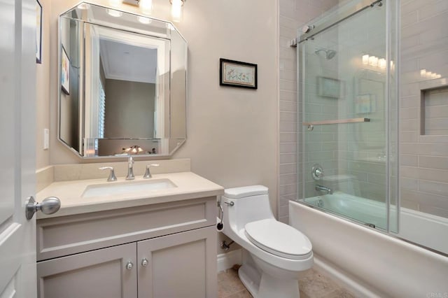 full bath with toilet, enclosed tub / shower combo, and vanity