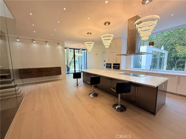 interior space featuring an inviting chandelier and sink