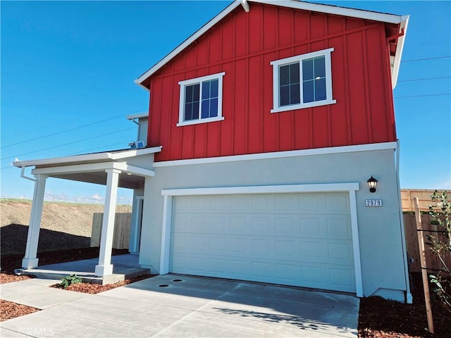 view of front of property with a garage