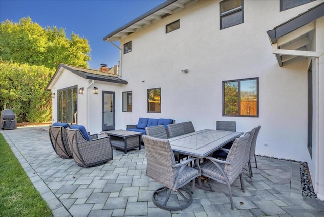 view of patio with an outdoor living space