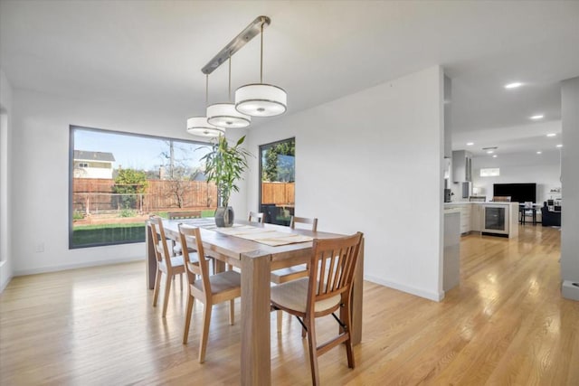 dining space featuring light hardwood / wood-style floors