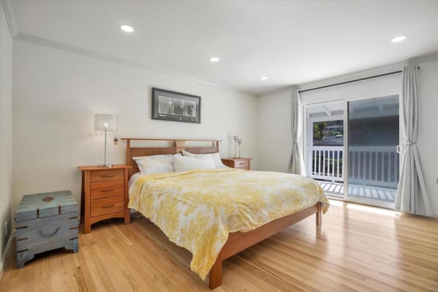 bedroom featuring ornamental molding, access to outside, and light wood-type flooring