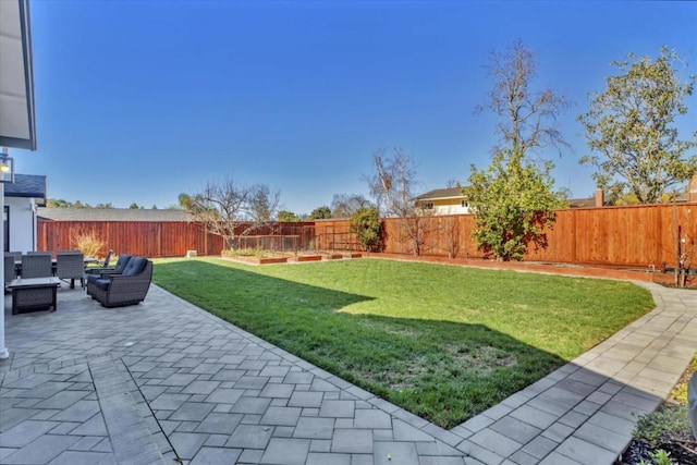 view of yard with outdoor lounge area and a patio area