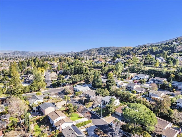 drone / aerial view featuring a mountain view