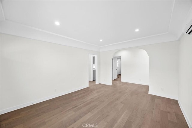 spare room with light hardwood / wood-style flooring