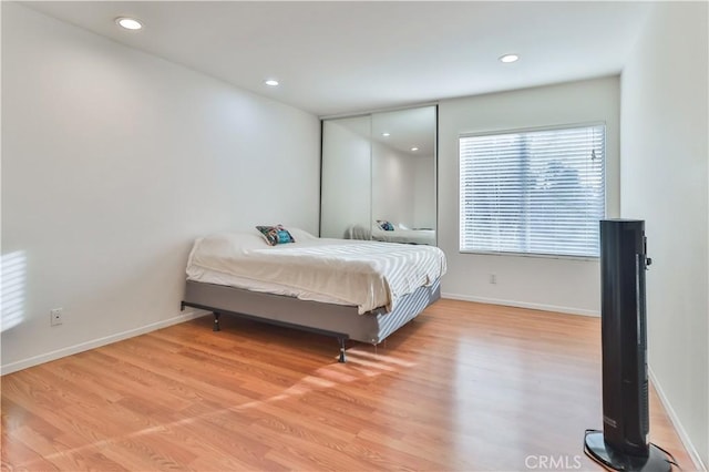 bedroom featuring light hardwood / wood-style flooring