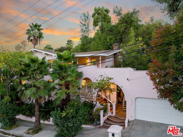 view of front of property with a garage