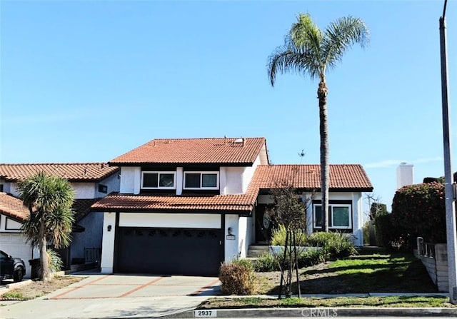 view of front of property with a garage