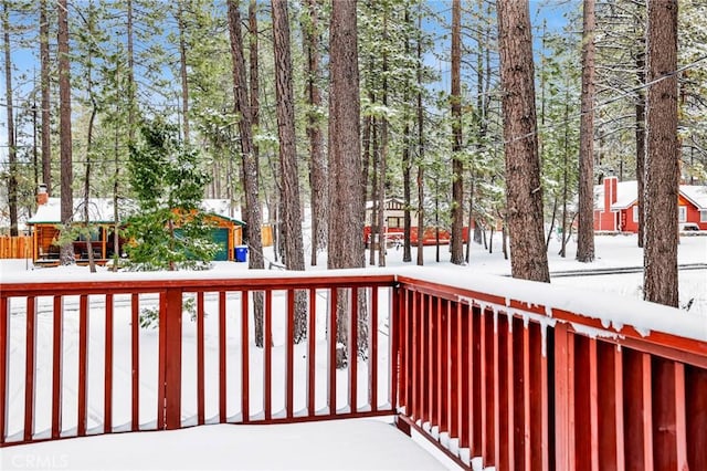 view of snow covered deck