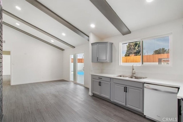 kitchen with sink, gray cabinets, dishwasher, a wealth of natural light, and lofted ceiling with beams