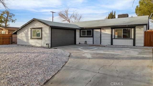 single story home with a garage