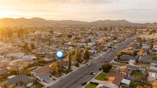 aerial view at dusk with a mountain view