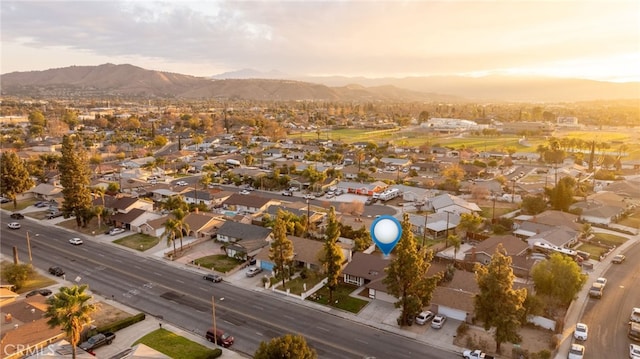 aerial view at dusk with a mountain view